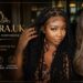 Hairstyle for round face featuring long layers and soft waves