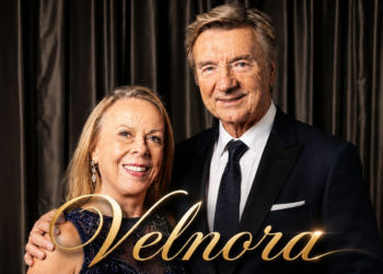 British ice dance legend Jayne Torvill performing on ice with Christopher Dean.