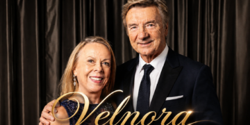 British ice dance legend Jayne Torvill performing on ice with Christopher Dean.