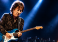 Masayoshi Takanaka playing guitar on stage during his 2026 world tour concert