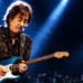 Masayoshi Takanaka playing guitar on stage during his 2026 world tour concert